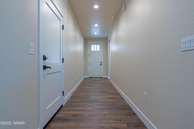 840 E Blue Jay Ln, Show Low, AZ 85901 - doorway to outside featuring recessed lighting, dark wood-style floors, and a textured wall