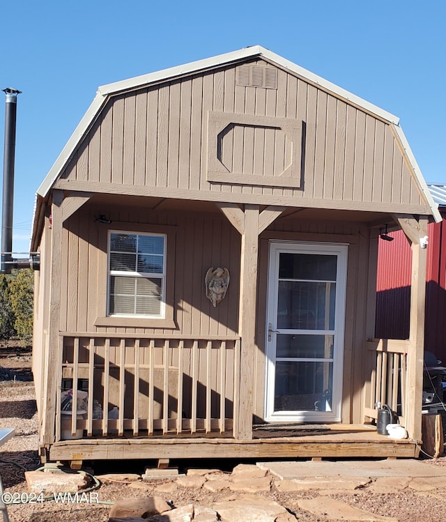 view of front of house with an outbuilding