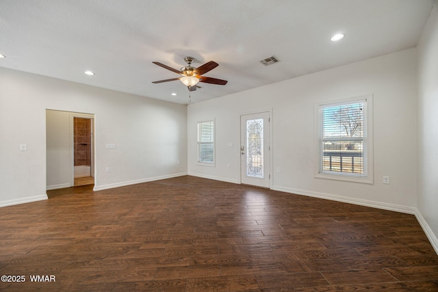 spare room with visible vents, baseboards, dark wood-style floors, ceiling fan, and recessed lighting