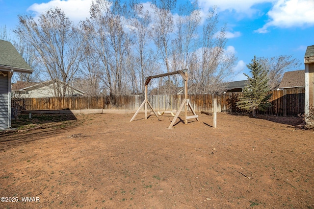 view of yard featuring a fenced backyard