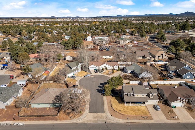 birds eye view of property featuring a mountain view and a residential view