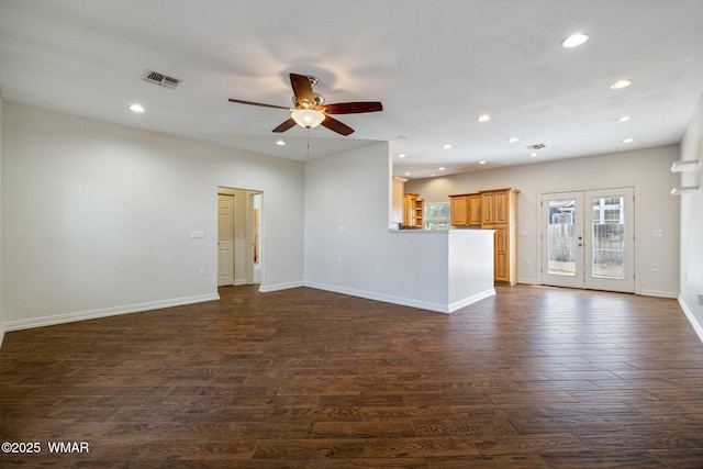 unfurnished living room featuring ceiling fan, visible vents, dark wood-style flooring, and recessed lighting