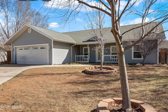 ranch-style home with an attached garage, a shingled roof, a porch, and concrete driveway