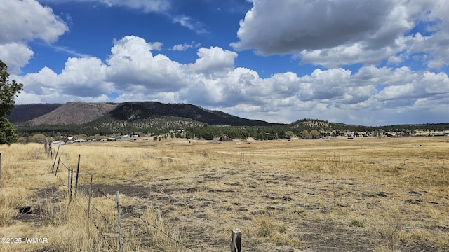 property view of mountains featuring a rural view
