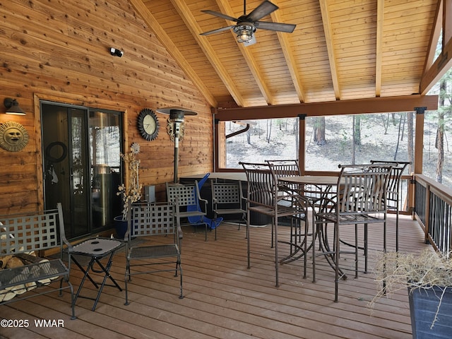 exterior space with ceiling fan and outdoor dining space