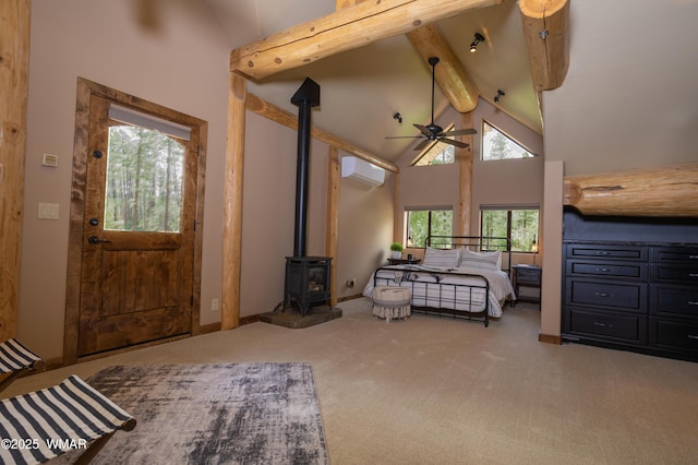 bedroom featuring carpet floors, beam ceiling, a wall unit AC, a wood stove, and high vaulted ceiling