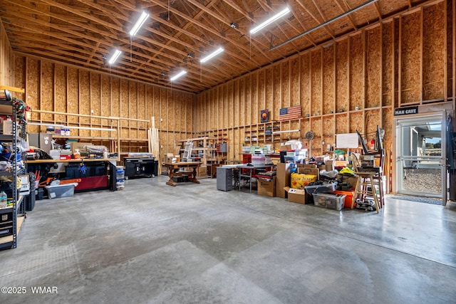 garage with a workshop area