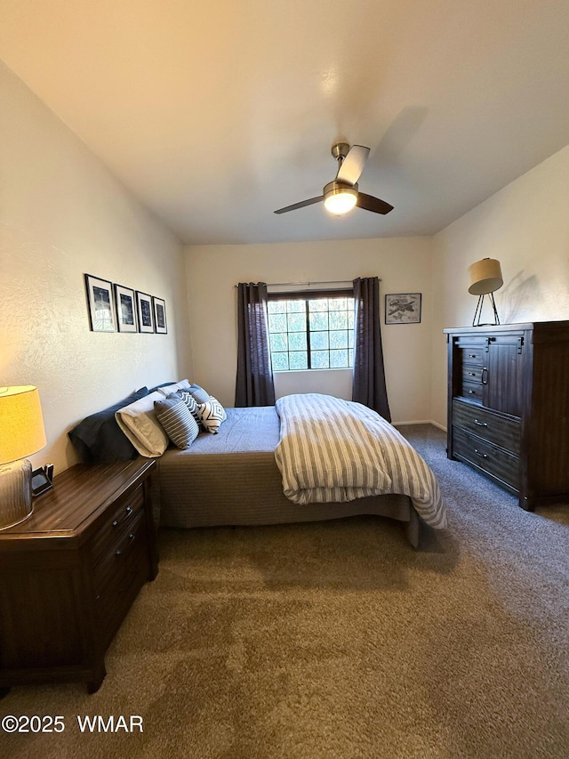 carpeted bedroom featuring a ceiling fan