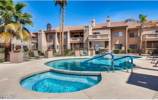 pool featuring fence