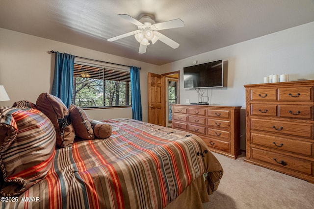 1761 N Bison Ct, Show Low, AZ 85901 - bedroom featuring light colored carpet and ceiling fan