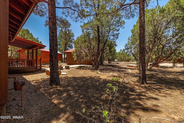1761 N Bison Ct, Show Low, AZ 85901 - view of yard with a wooden deck