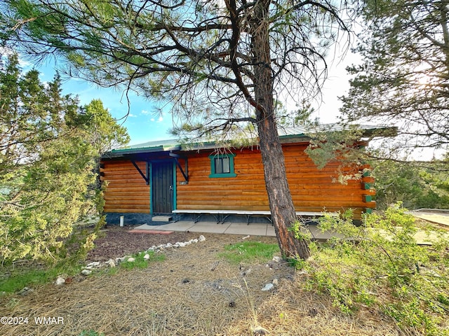 3403 Top View Rd, Overgaard, AZ 85933 - rear view of house with log exterior