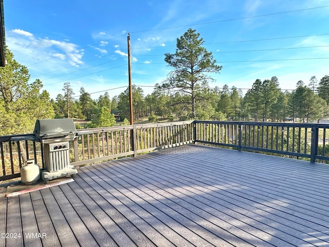 3403 Top View Rd, Overgaard, AZ 85933 - deck featuring grilling area and view of wooded area