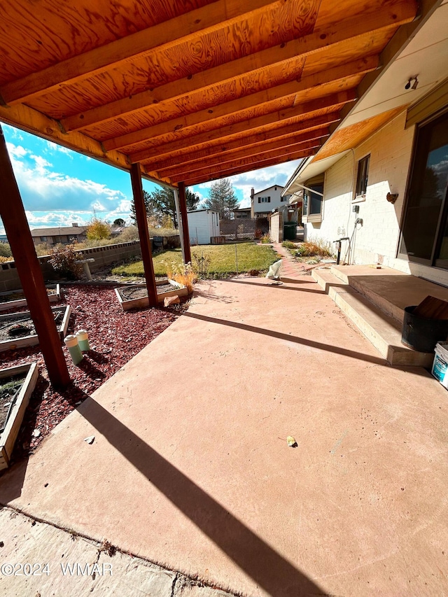 view of patio with fence