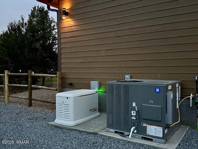 2344 Hellcat Cir, Overgaard, AZ 85933 - exterior view of a power unit and a central AC unit