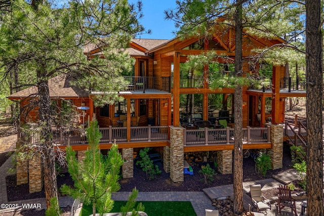 4040 W Ninebark Ln, Show Low, AZ 85901 - rear view of property with a shingled roof and a deck