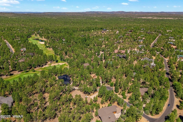 4040 W Ninebark Ln, Show Low, AZ 85901 - aerial view of property and surrounding area featuring a heavily wooded area