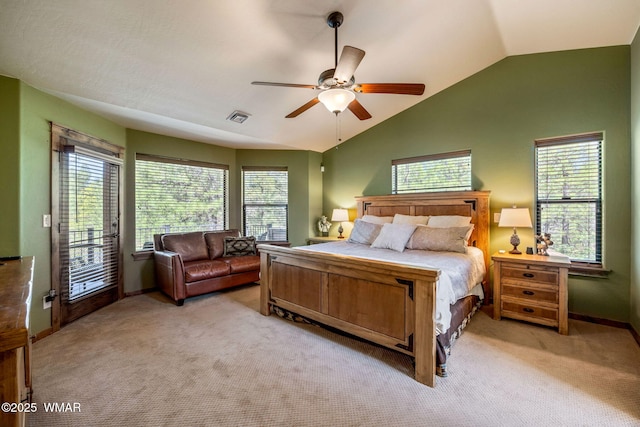 4040 W Ninebark Ln, Show Low, AZ 85901 - carpeted bedroom featuring lofted ceiling, multiple windows, access to exterior, and a ceiling fan