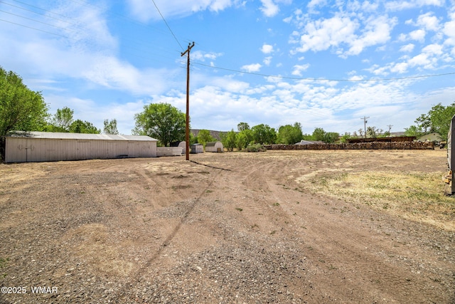 367 S Main St, Eagar, AZ 85925 - view of yard featuring a pole building and an outdoor structure