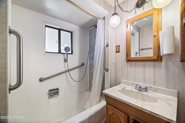 367 S Main St, Eagar, AZ 85925 - bathroom featuring wallpapered walls, shower / bath combo with shower curtain, and vanity