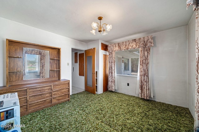 367 S Main St, Eagar, AZ 85925 - unfurnished dining area featuring carpet, a chandelier, and heating unit