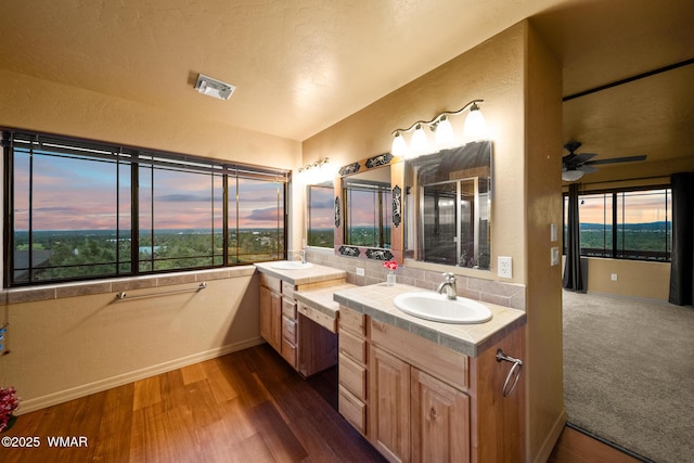 1511 S Canyon Ridge Trl, Show Low, AZ 85901 - full bath with baseboards, healthy amount of natural light, vanity, and wood finished floors
