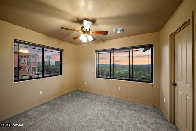 1511 S Canyon Ridge Trl, Show Low, AZ 85901 - carpeted empty room featuring a ceiling fan and baseboards