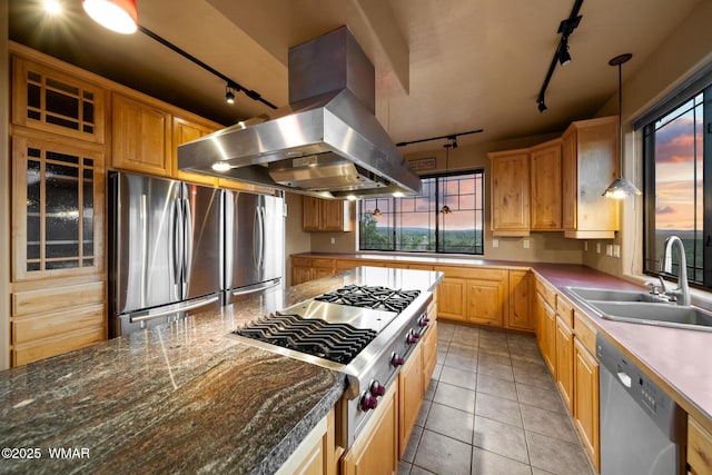 1511 S Canyon Ridge Trl, Show Low, AZ 85901 - kitchen with track lighting, island range hood, stainless steel appliances, a sink, and light tile patterned floors