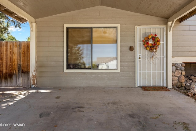 327 W 10th St, Eagar, AZ 85925 - view of exterior entry with fence and a patio area