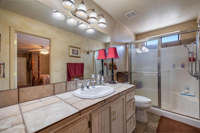 327 W 10th St, Eagar, AZ 85925 - full bath featuring vanity, toilet, tile patterned floors, a shower stall, and visible vents