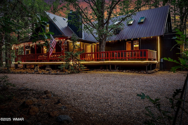 2444 S Jan Ln, Pinetop, AZ 85935 - view of front of house featuring a metal roof and a chimney