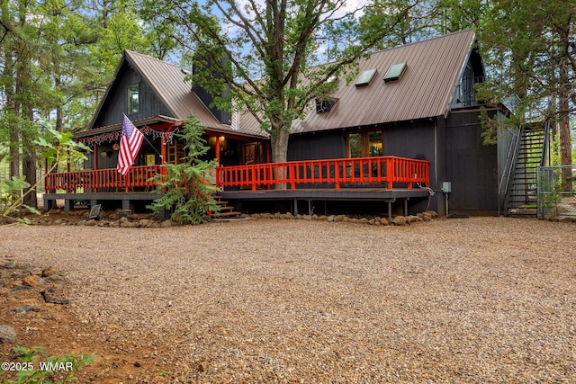 2444 S Jan Ln, Pinetop, AZ 85935 - back of house with a metal roof and a deck