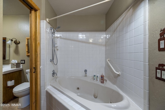2444 S Jan Ln, Pinetop, AZ 85935 - full bathroom with a textured wall, vanity, and a combined bath / shower with jetted tub