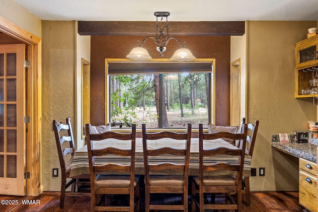 2444 S Jan Ln, Pinetop, AZ 85935 - dining space featuring a textured wall, dark wood-style flooring, a chandelier, and beam ceiling