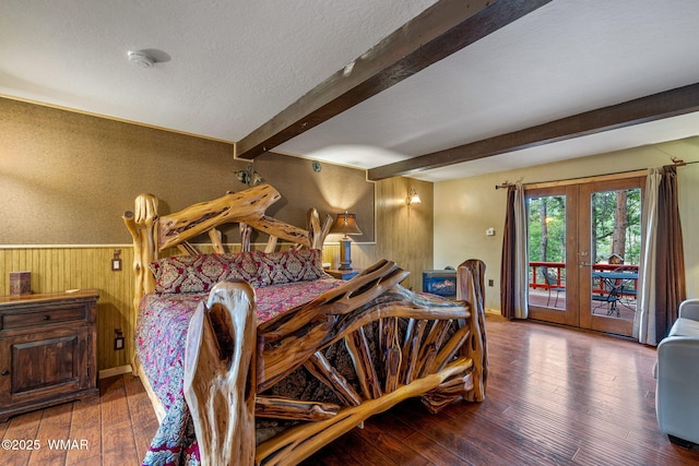 2444 S Jan Ln, Pinetop, AZ 85935 - bedroom with french doors, access to outside, beamed ceiling, hardwood / wood-style flooring, and wooden walls