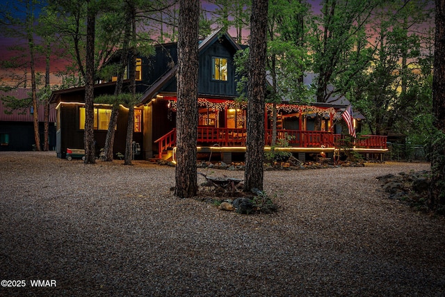 2444 S Jan Ln, Pinetop, AZ 85935 - chalet / cabin with a wooden deck and gravel driveway