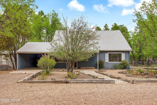3510 Sunset Ln, Lakeside, AZ 85929 - view of front of house featuring a shingled roof, an attached carport, and driveway