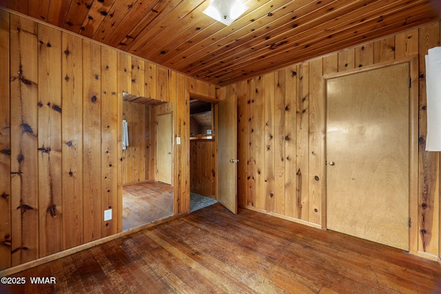 3510 Sunset Ln, Lakeside, AZ 85929 - unfurnished bedroom featuring wood ceiling, wood walls, and hardwood / wood-style floors