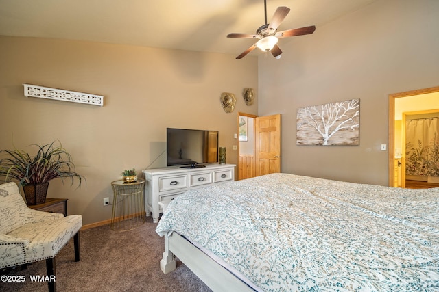 bedroom featuring ceiling fan, a high ceiling, carpet flooring, and baseboards