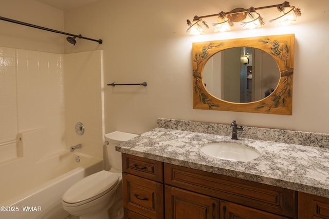 full bathroom featuring toilet, shower / bathing tub combination, and vanity