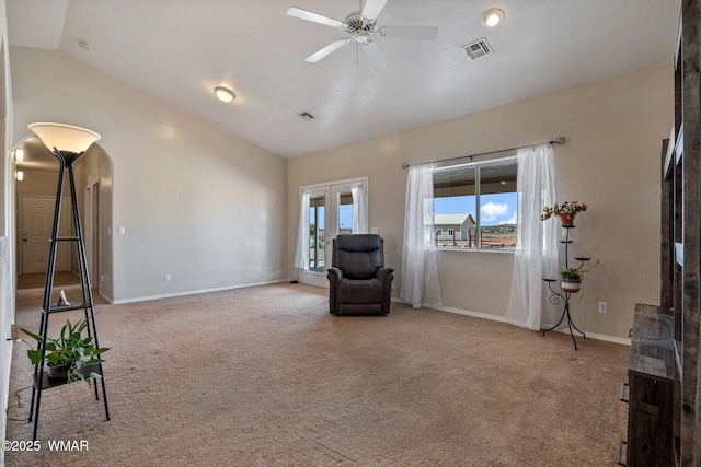 2740 E Walnut Dr, Taylor, AZ 85939 - living area featuring vaulted ceiling, french doors, carpet floors, and baseboards