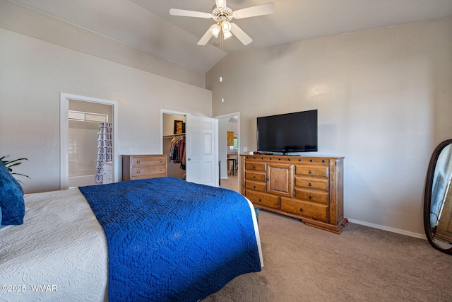2740 E Walnut Dr, Taylor, AZ 85939 - carpeted bedroom featuring high vaulted ceiling, connected bathroom, a ceiling fan, baseboards, and a walk in closet