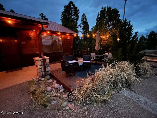 view of patio / terrace featuring a deck and an outdoor hangout area