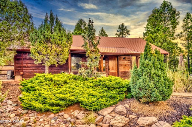 view of front of house featuring metal roof