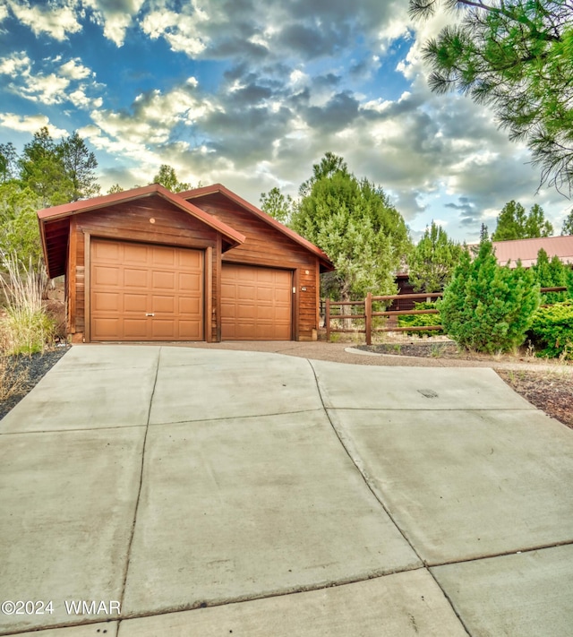 detached garage with fence