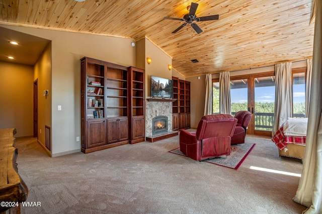 carpeted living area featuring lofted ceiling, visible vents, wood ceiling, a warm lit fireplace, and baseboards