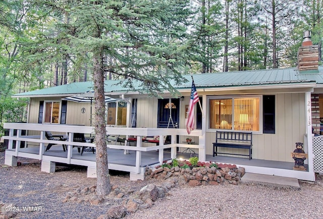 2413 Lupine Cir, Pinetop, AZ 85935 - view of front facade featuring metal roof and a chimney