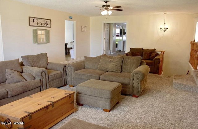 living area with ceiling fan