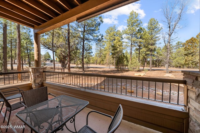 balcony with outdoor dining area