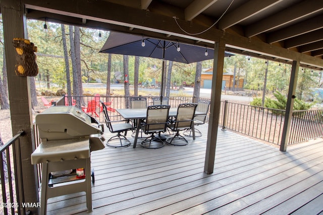6970 Palomino Dr, Pinetop, AZ 85935 - wooden deck featuring outdoor dining area and a grill